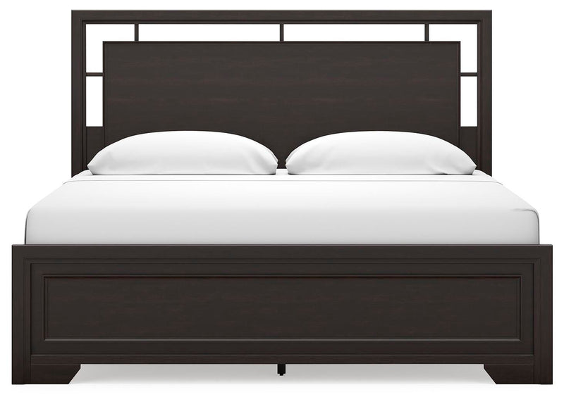 Ashley Furniture Covetown bedroom set featuring a stylish bed frame with matching dresser and nightstands in a modern design.