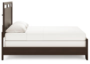 Ashley Furniture Covetown Bedroom Set with bed, nightstands, and dresser arranged in a modern bedroom scene.