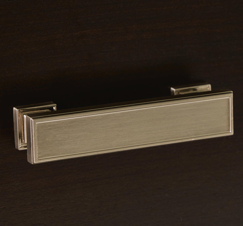 Ashley Furniture Covetown Chest of Drawers with detailed handle design, showcasing a stylish wooden storage piece.