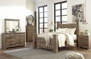 Ashley Furniture Trinell bedroom fireplace set featuring a cozy, stylish design with built-in shelves and decorative accents.