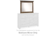 Ashley Furniture Trinell bedroom mirror with a sleek rectangular design and a dark wood frame.