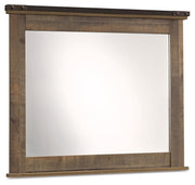 Ashley Furniture Trinell bedroom mirror with a sleek, rectangular design and a polished wood frame for modern bedroom decor.