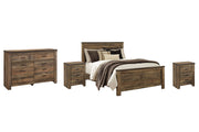 Ashley Furniture Trinell bedroom fireplace set with a cozy fireplace, wooden mantel, and decorative accents in a modern bedroom setting.