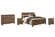 Ashley Furniture Trinell bedroom set fireplace insert with decorative mantel and surrounding wood accents, styled for a cozy room.