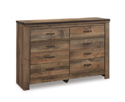 Ashley Furniture Trinell bedroom fireplace set with a cozy fire feature, featuring a stylish mantel and decorative accents.