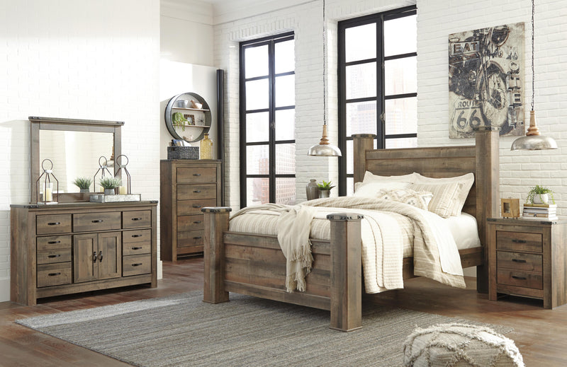 Ashley Furniture Trinell bedroom fireplace set with a cozy fireplace and matching decor, showcasing warm, inviting design elements.
