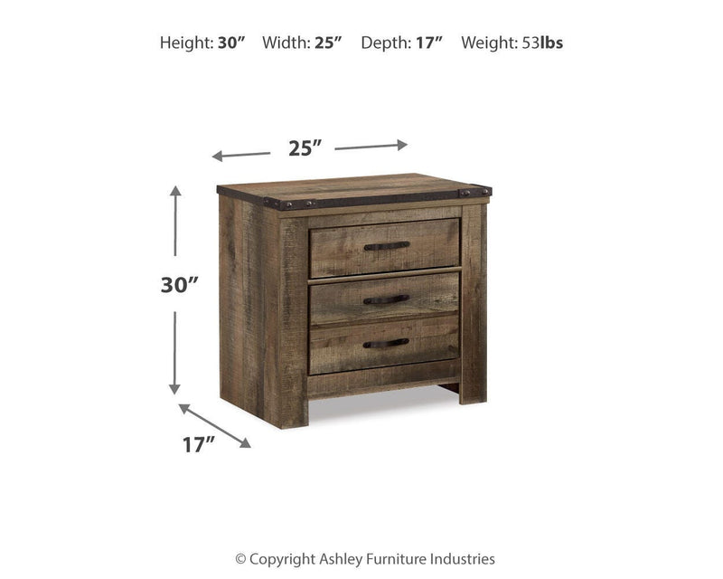 Ashley Furniture Trinell bedroom fireplace set featuring a classic design with a built-in fireplace and matching furniture pieces.