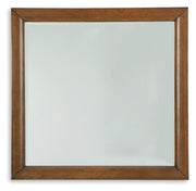 Ashley Furniture Lyncott bedroom mirror with a sleek, framed design suitable for bedroom decor.