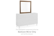 Ashley Furniture Lyncott Bedroom Mirror with a sleek rectangular design and beveled edges, mounted on a white frame.
