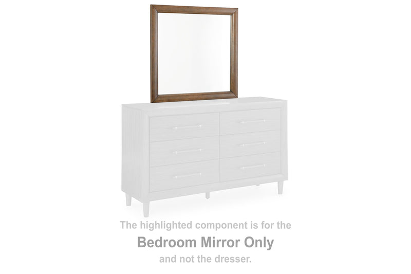 Ashley Furniture Lyncott Bedroom Mirror with a sleek rectangular design and beveled edges, mounted on a white frame.