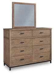 Ashley Furniture Tomtyn dresser with matching mirror, featuring a sleek wooden finish and modern design.