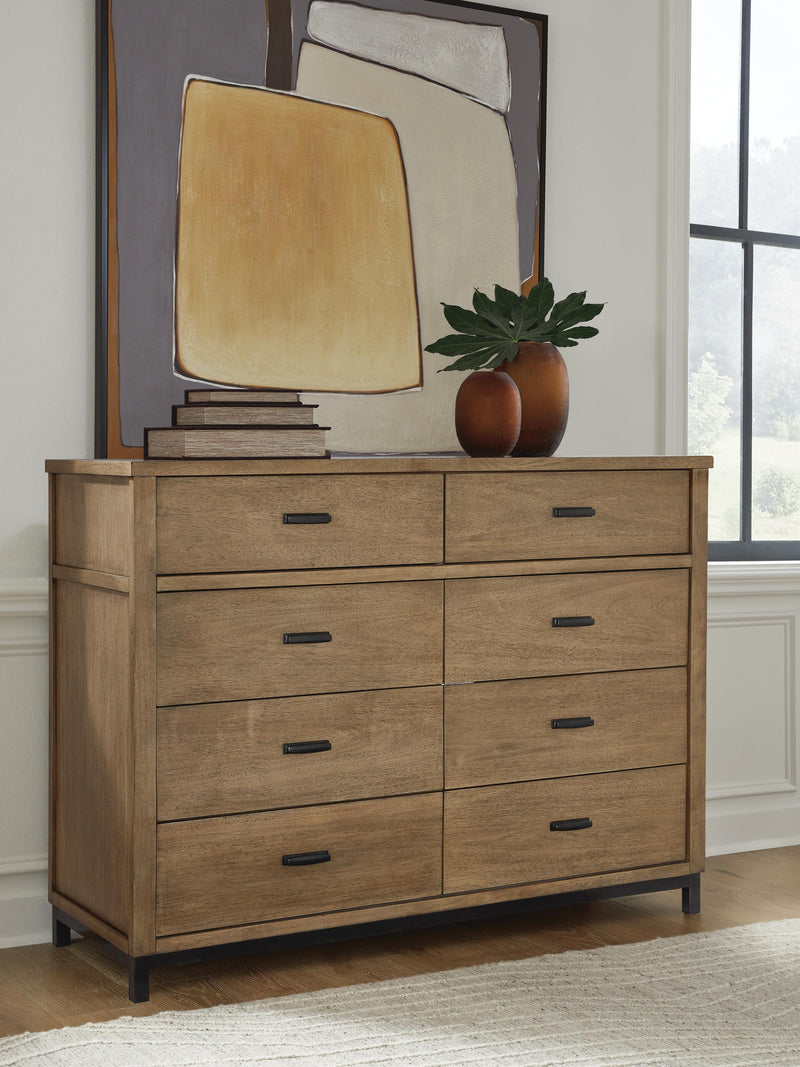 Ashley Furniture Tomtyn dresser with sleek wood finish and modern design, featuring multiple drawers for ample storage.