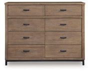 Ashley Furniture Tomtyn dresser with sleek wood finish and multiple drawers, shown from a front head-on view.