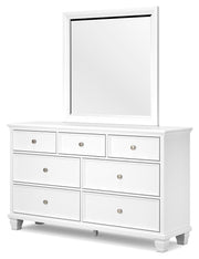 Ashley Furniture Fortman dresser and mirror set, showing a sleek wooden dresser with matching mirror against a neutral background.
