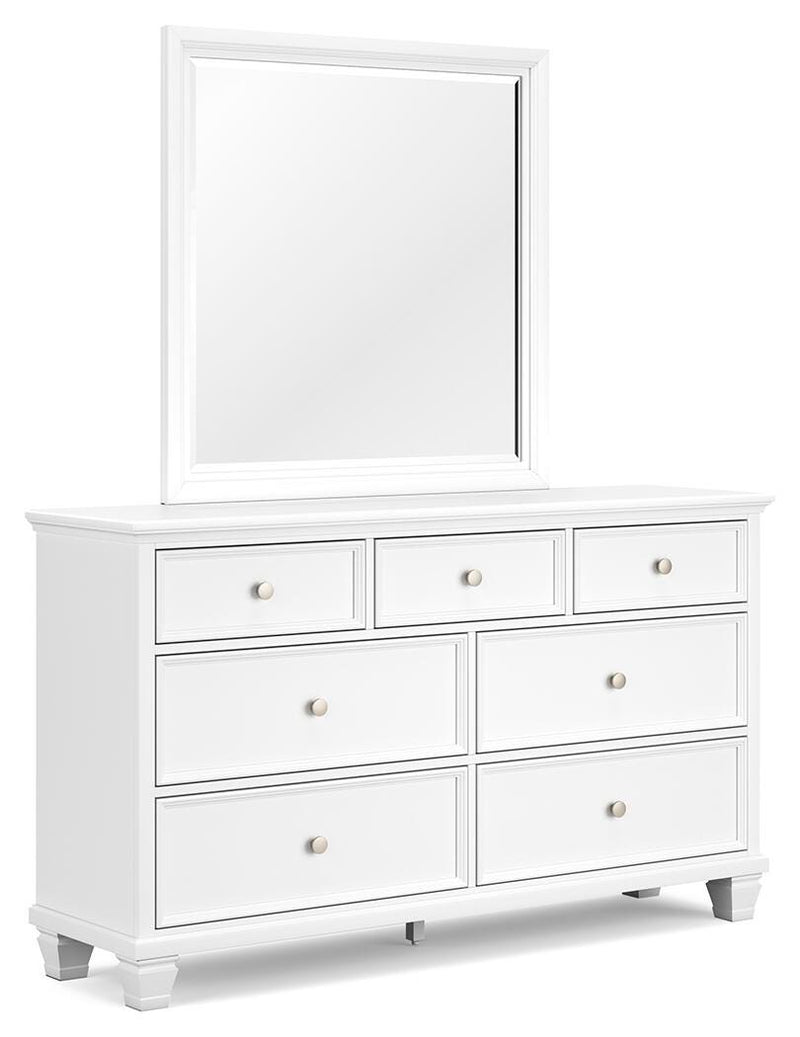 Ashley Furniture Fortman dresser and mirror set, showing a stylish wooden dresser with a matching mirror in a modern bedroom setting.