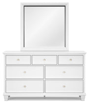 Ashley Furniture Fortman dresser with matching mirror, wooden finish, and detailed hardware in a modern bedroom setup.