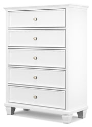 Ashley Furniture Fortman chest of drawers with a modern wood finish, shown from an angled view highlighting its sleek design.