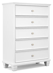Ashley Furniture Fortman chest of drawers with a sleek wood finish, angled design, and multiple storage drawers.