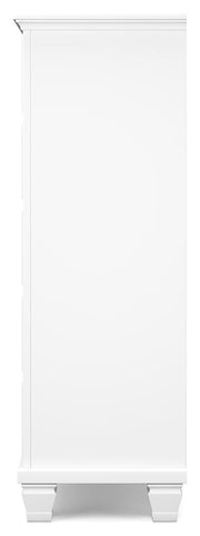 Ashley Furniture Fortman chest of drawers with a sleek wooden finish and modern design, shown from a side angle.