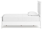 Ashley Furniture Fortman Bed showing a stylish wooden bed frame with a dark finish and modern design in a bedroom setting.