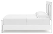 Ashley Furniture Fortman bed with a sleek wooden frame and modern design, shown in a side view.