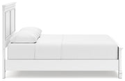 Ashley Furniture Fortman bed with a wooden frame and side panels, showcasing a modern bedroom design.