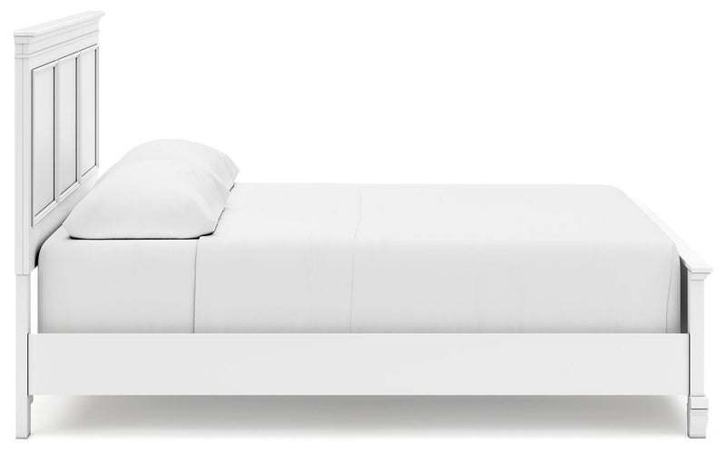 Ashley Furniture Fortman bed with a wooden frame and side panel, featuring a modern design and warm wood finish.