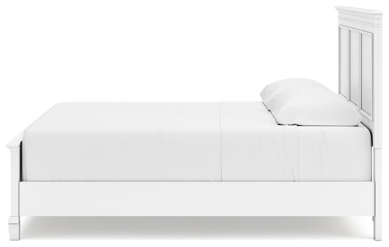 Ashley Furniture Fortman Bed with a modern design, showcasing a sturdy wooden frame and sleek headboard in natural wood finish.