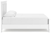 Ashley Furniture Fortman Bed with a sleek wooden frame, shown from the side, featuring a modern design and sturdy construction.