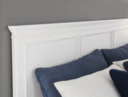 Close-up of Ashley Furniture Fortman Bed showing detailed wood finish and elegant bed frame design.