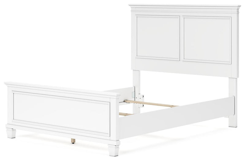 Ashley Furniture Fortman bedroom set with a bed, nightstands, and dresser in a modern bedroom arrangement.