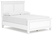 Ashley Furniture Fortman Bed with a stylish, modern frame shown from an angle, featuring a sleek headboard and contemporary design.