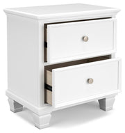 Ashley Furniture Fortman bedroom set with a modern bed frame, nightstands, and dresser in a stylish bedroom layout.