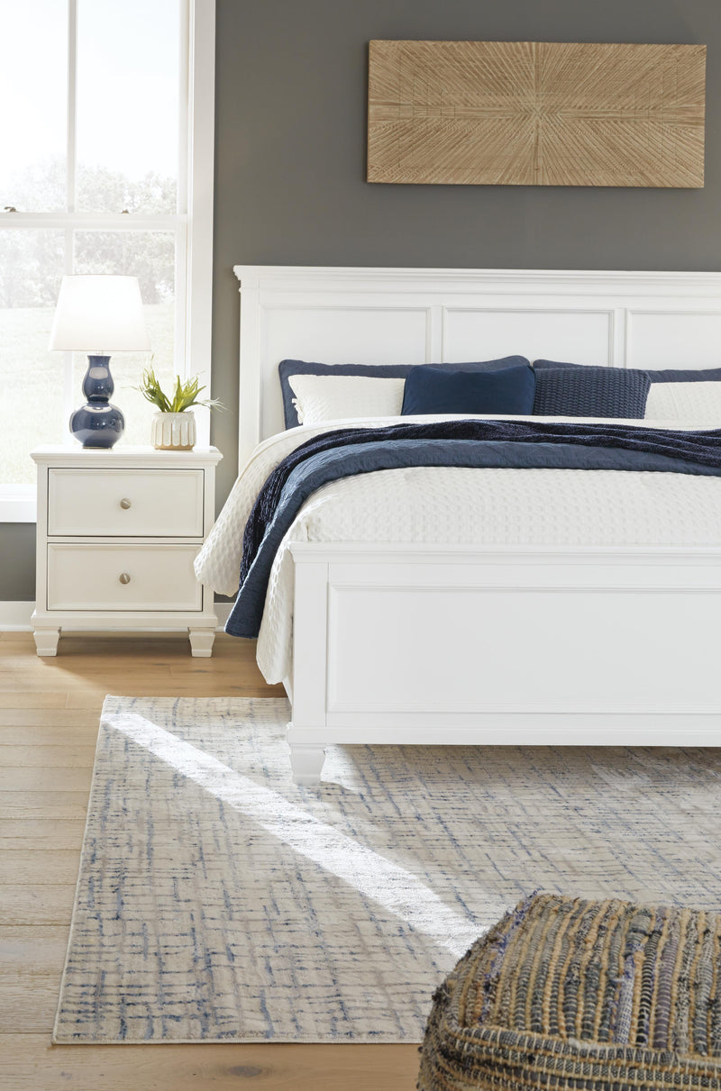 Ashley Furniture Fortman Bed with a sleek wooden frame and modern design, shown in a cozy bedroom setting.