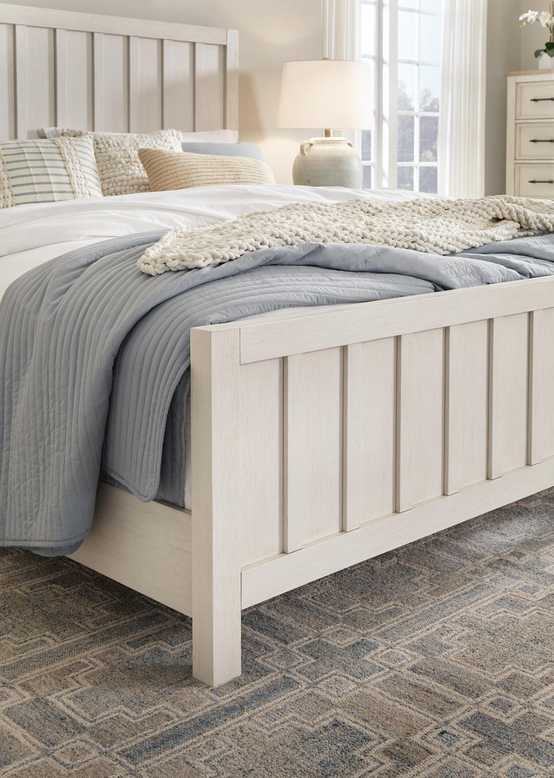 Ashley Furniture Shaybrock Bed with detailed wood finish and classic design, showcasing the elegant bedroom furniture piece.