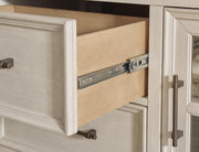 Ashley Furniture Shaybrock bedroom set featuring a dark wood dresser with glide drawers and matching bedroom furniture.