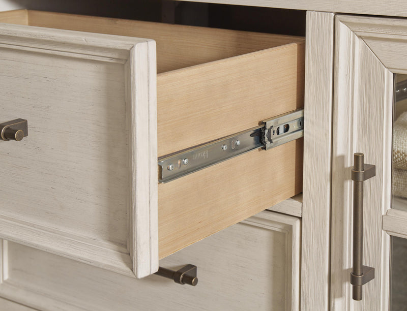 Ashley Furniture Shaybrock bedroom set featuring a dark wood dresser with glide drawers and matching bedroom furniture.