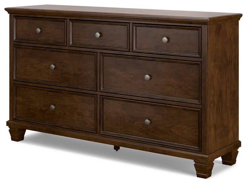 Ashley Furniture Danabrin Dresser with six drawers and modern design, shown in a side-angle view.