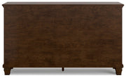 Ashley Furniture Danabrin dresser with sleek wood finish and modern design, featuring multiple drawers for ample storage.