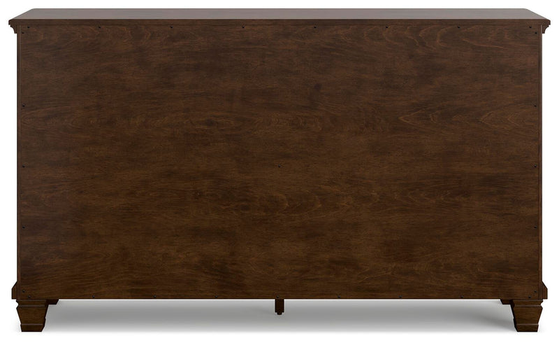 Ashley Furniture Danabrin dresser with sleek wood finish and modern design, featuring multiple drawers for ample storage.