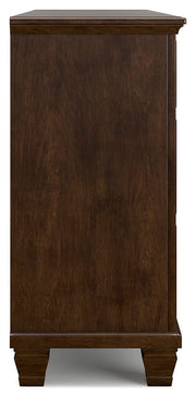 Ashley Furniture Danabrin dresser with sleek wood finish and modern design, featuring multiple drawers for ample storage.