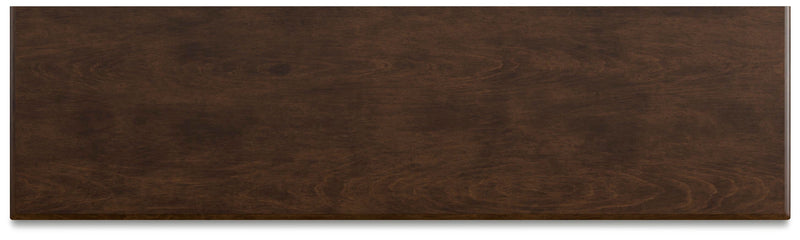 Ashley Furniture Danabrin dresser with a dark wood finish, featuring sleek drawer handles and a spacious top surface.