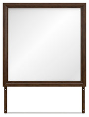 Ashley Furniture Danabrin bedroom mirror with a sleek rectangular design and a polished wood frame.