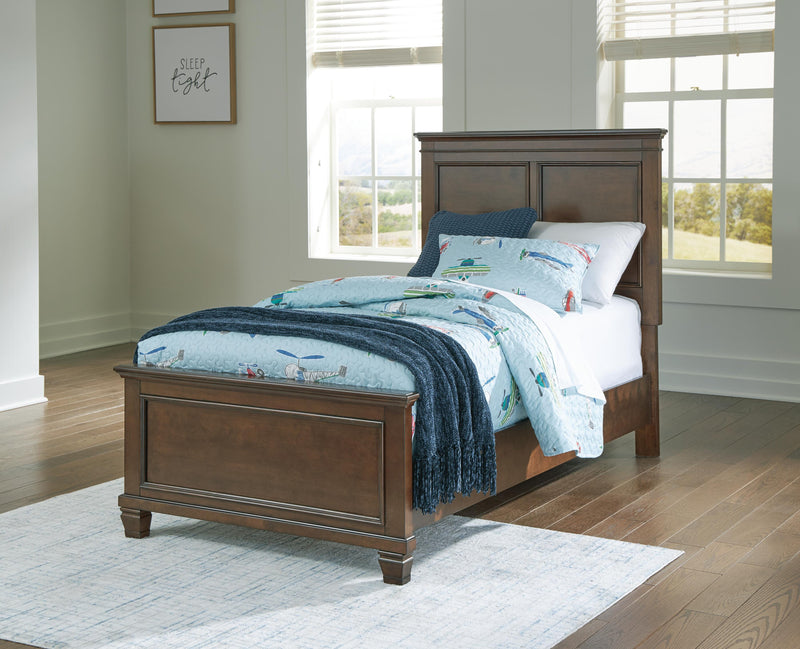 Ashley Furniture Danabrin Bed with a modern wooden frame and headboard, showcasing a stylish bedroom furniture piece.