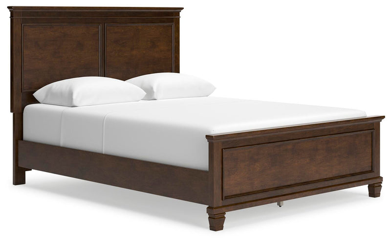 Ashley Furniture Danabrin Bed with a stylish headboard and frame, shown from an angled view in a bedroom setting.