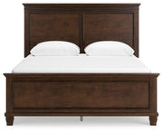 Ashley Furniture Danabrin Bed with a sleek headboard and modern design, shown from a front angle in the image.