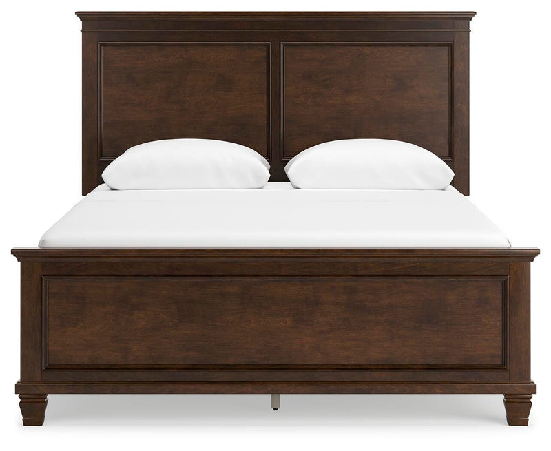 Ashley Furniture Danabrin Bed with a sleek headboard and modern design, shown from a front angle in the image.