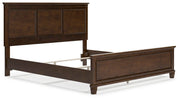 Ashley Furniture Danabrin bed with a modern design, featuring a sturdy wooden frame and a sleek, upholstered headboard.