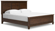Ashley Furniture Danabrin Bed with a sleek frame and upholstered headboard, shown from an angled side view.