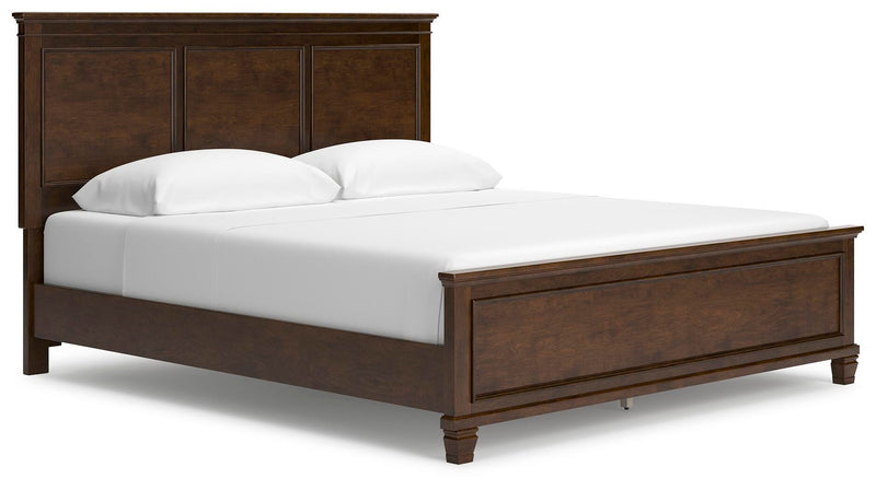 Ashley Furniture Danabrin Bed with a sleek frame and upholstered headboard, shown from an angled side view.